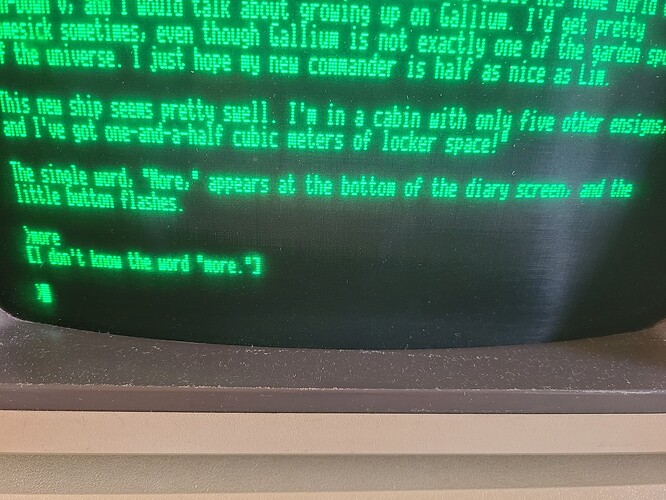 Planetfall's diary entry screen. The last sentence says "The single word, "More", appears at the bottom of the diary screen, and the little button flashes." The command "more" is met with "I don't know the word "more.""