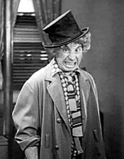 Comedian Harpo Marx making a funny face.